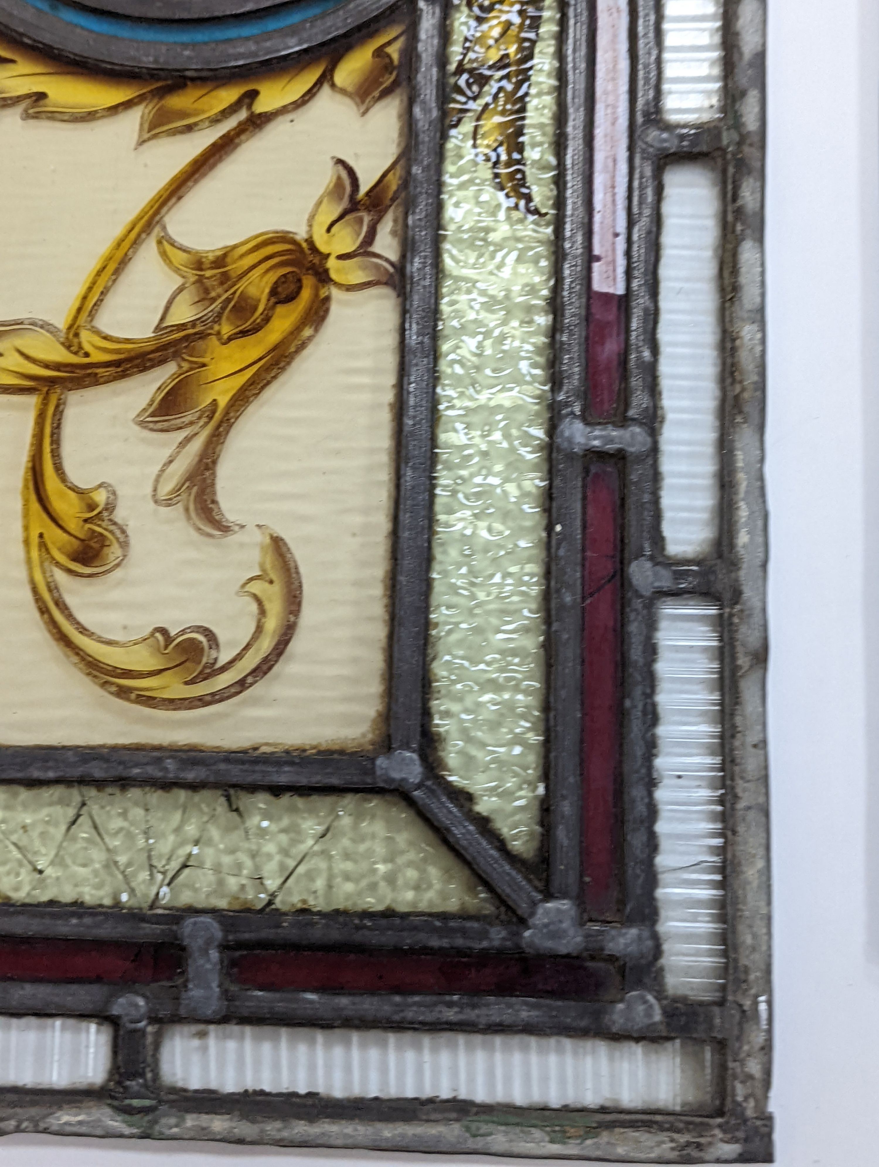 Two 19th century stained glass panels, largest 68x28cm